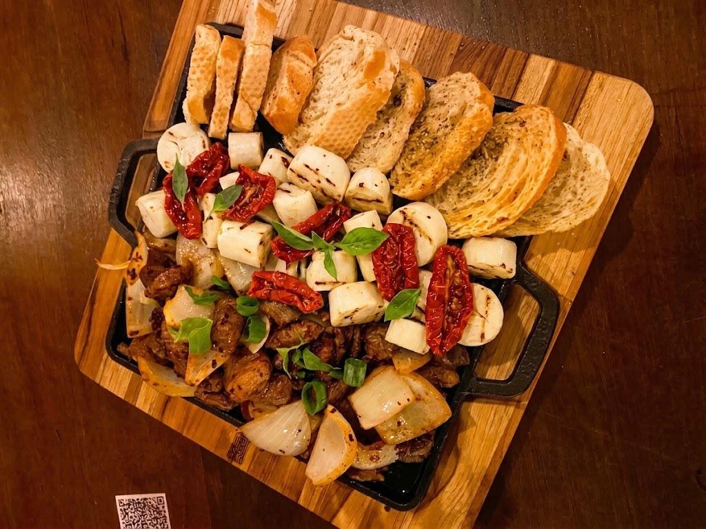 PORÇÃO DE FRALDINHA C/ PALMITO E TOMATE SECO